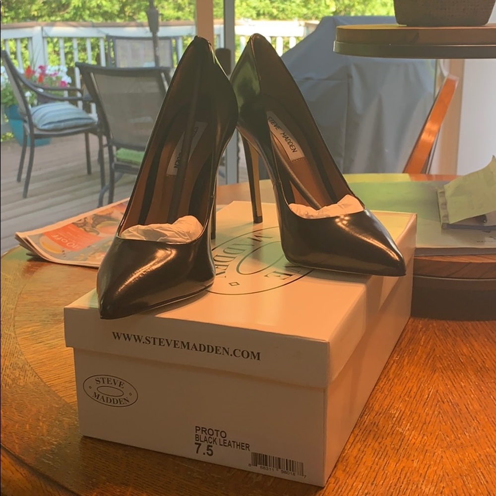 Black leather pumps